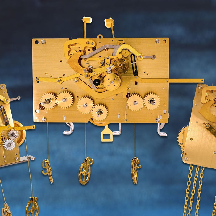 Brass clock movements with visible gears on blue background.