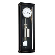 Black wall clock with dual weights and pendulum on a white background