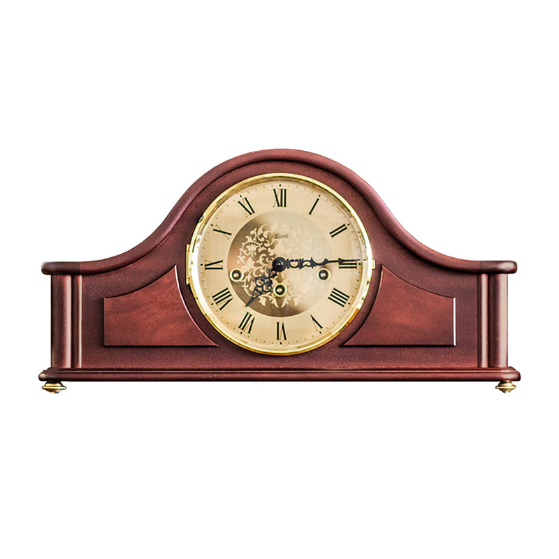 Wooden tambour style mantel clock with roman numerals, on a white background