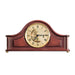 Wooden tambour style mantel clock with roman numerals, on a white background