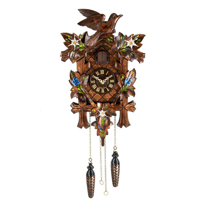 Wooden cuckoo clock with detailed design featuring flowers and birds on a white background