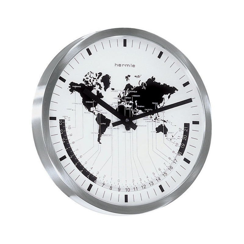 World map clock with silver framing and black hands on white background.