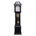 Black finish wood Grandmother clock with brass highlights on white background