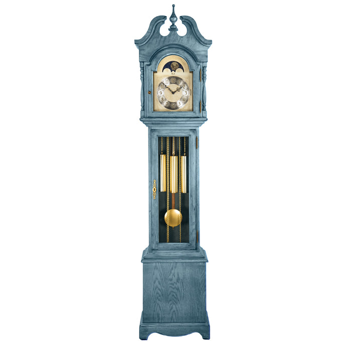 Blue finish wood Grandmother clock with brass highlights on white background