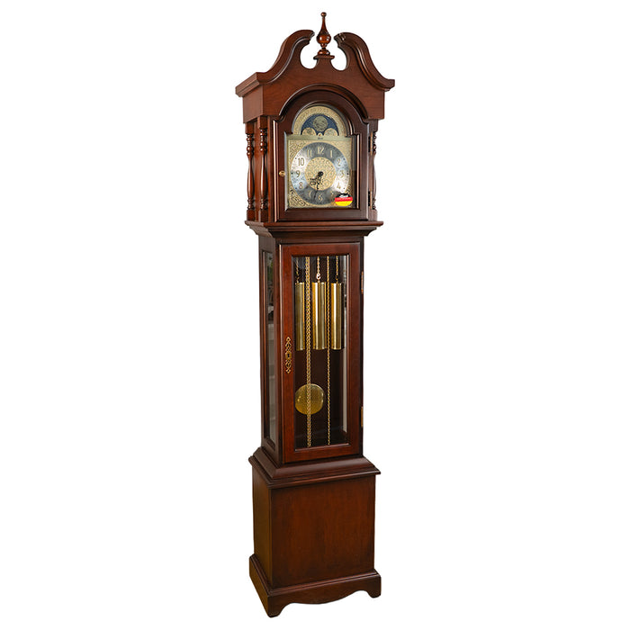 Cherry wood Grandmother clock with brass highlights on white background.