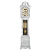 White finish wood Grandmother clock with brass highlights on white background