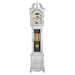 White finish wood Grandmother clock with brass highlights on white background