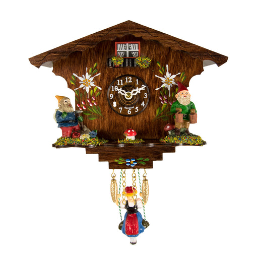 Wooden vintage style cuckoo clock with gnomes and girl on swing on white background.