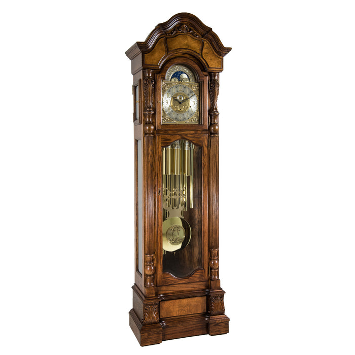 Oak wood grandfather clock with detailed design and chime tubes on a white background