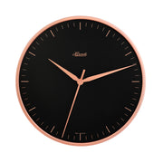 Wall clock with rose gold highlights and black face with Hermle logo on white background.