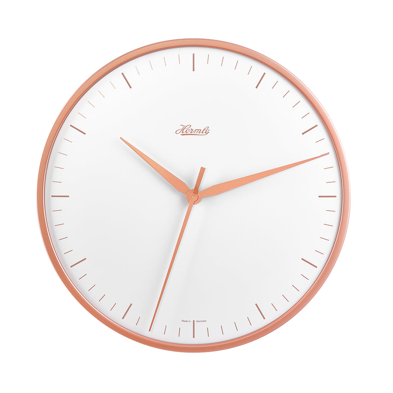 Wall clock with rose gold highlights and white face with Hermle logo on white background.