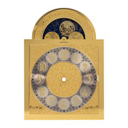 Brass clock face with moon dial and ornate design on white background.
