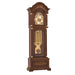 Ornate grandfather clock with brass highlights and intricate flower inlay