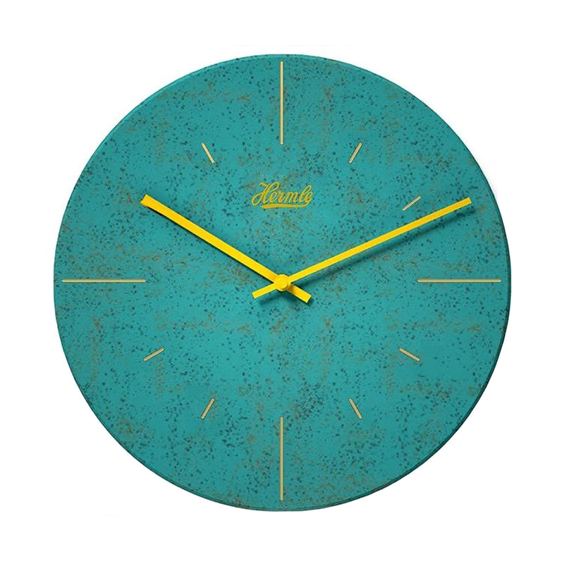 Teal wall clock with yellow hands and Hermle logo on what background.