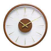 Wooden wall clock with gold numeral markings and hands with clear ridged plastic face on white background.