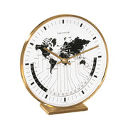 Brass desk clock with brass hands and world map on face.