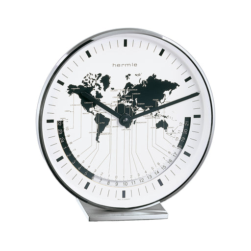 Nickel desk clock with black hands and world map on face.