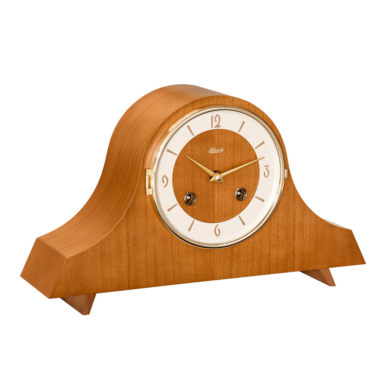 Light Cherry wood mantel clock with holes in the face for winding the mechanical movement inside 