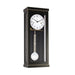 Black wall clock with white face and brass hammers