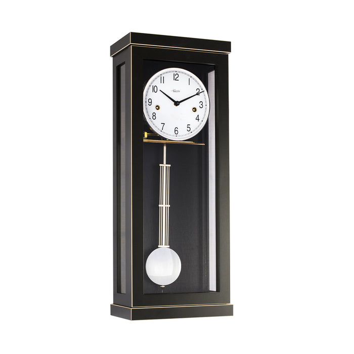 Black wall clock with white face and brass hammers