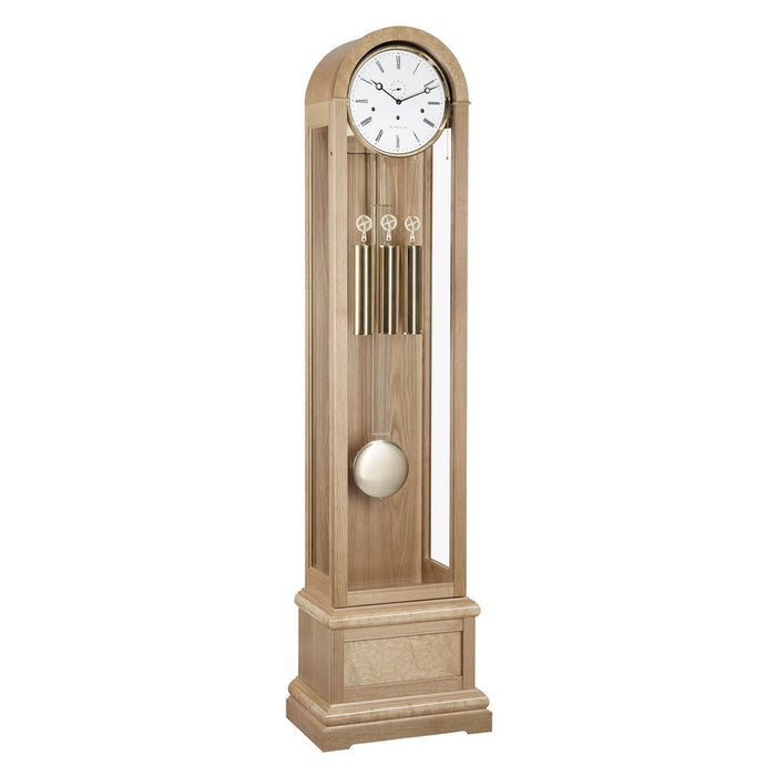 Oak Grandfather clock with brass weights and pendulum on white background