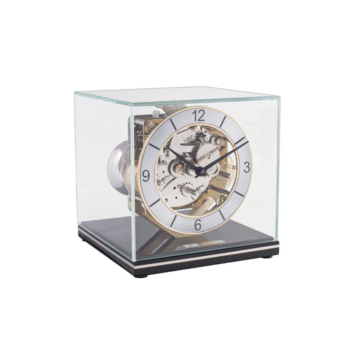 Mechanical desk clock with glass case, black base  and intricate gears
