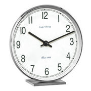 Nickel desk clock with bold numbers and Hermle logo on white background.