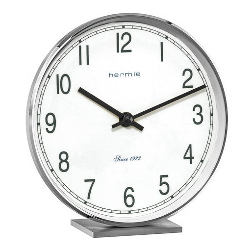 Nickel desk clock with bold numbers and Hermle logo on white background.