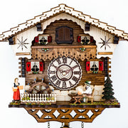 Up close German cuckoo clock with wooden roman numeral face and cottage style with figurines 