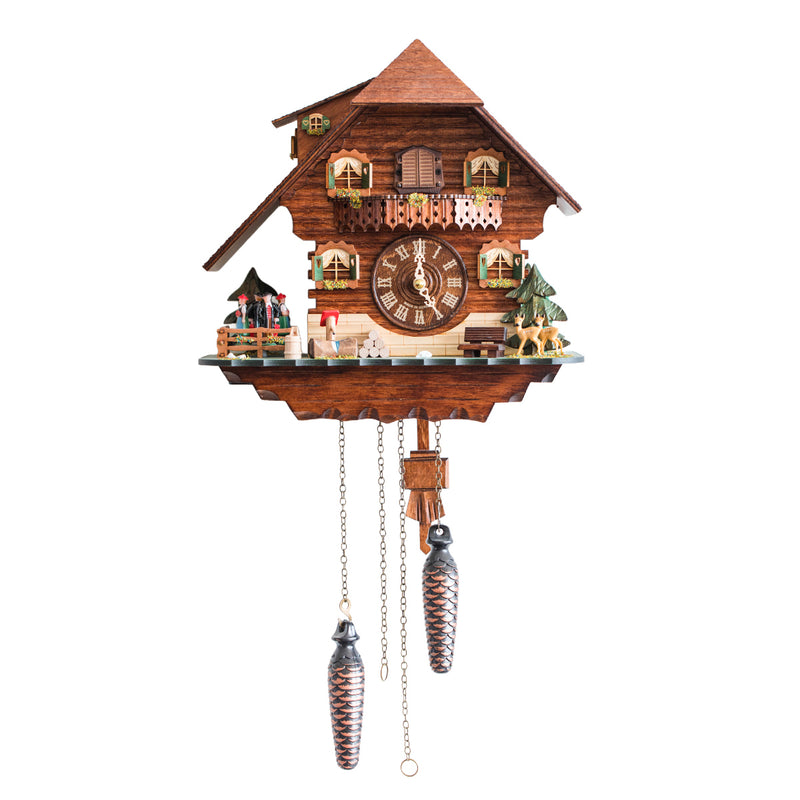 Wooden chalet style cuckoo clock with pine trees, and roman numeral dial on white background.