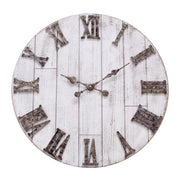Rustic wood wall clock with metal hands and roman numerals on white background.