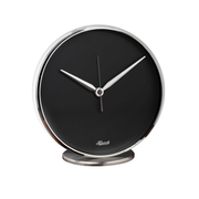 Round black and metallic desk clock in minimalist style, on white background.