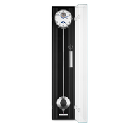 Black luxury wall clock with pendulum in clear glass case on a white background.