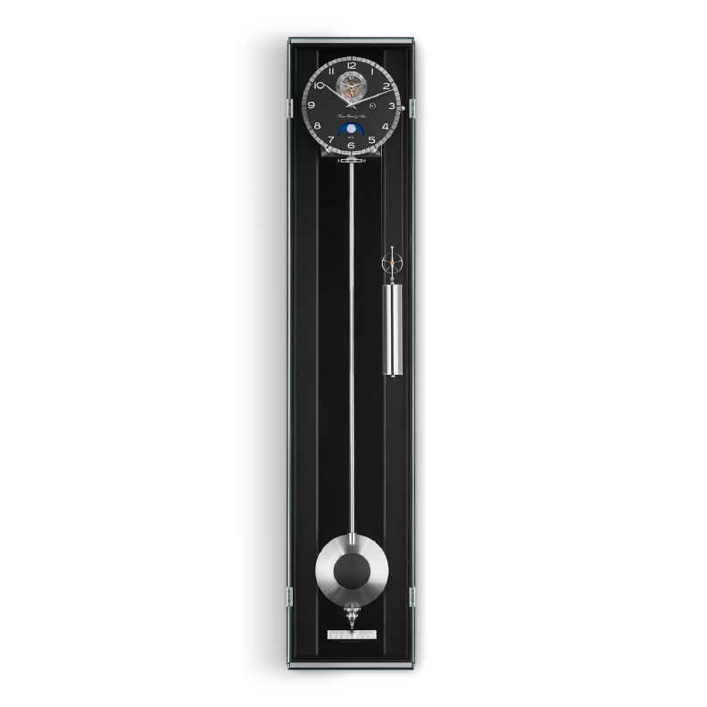 Black wall clock with silver pendulum on a white background