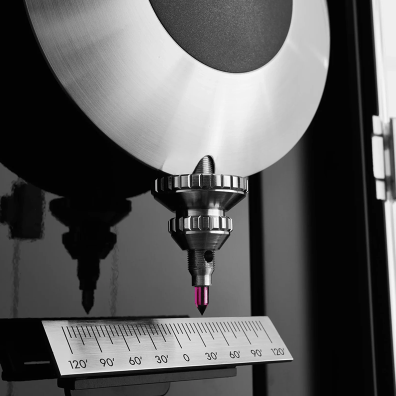 Metal pendulum of luxury clock with ruby point. 