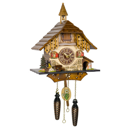 Wooden cuckoo clock with bell tower and roman numeral dial on white background.