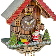 Close-up of Santa Claus themed cuckoo clock.