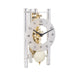 Silver and brass mechanical clock with glass face on white background