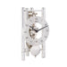 Silver mechanical clock with glass face on white background