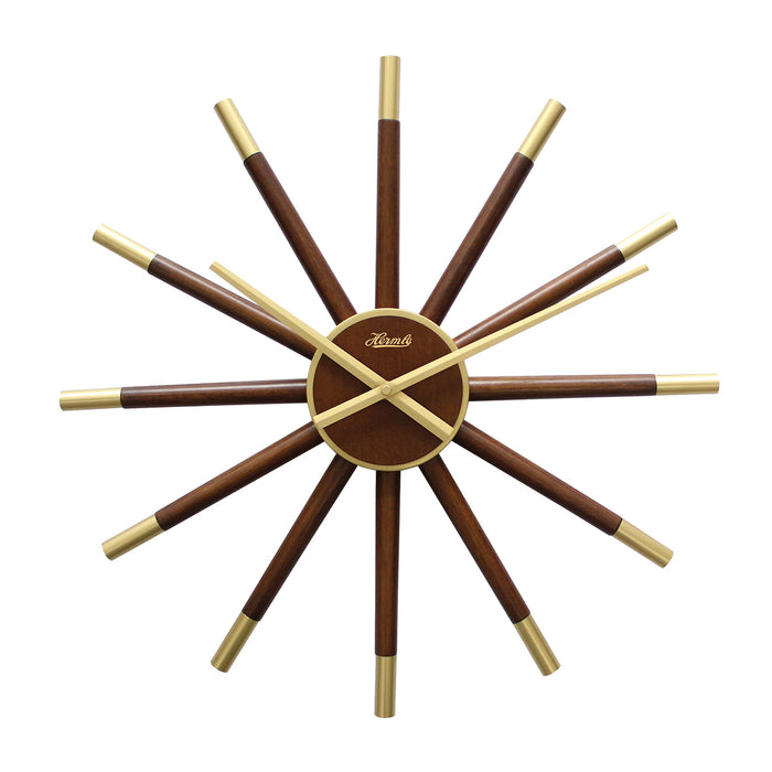 Sunburst style wooden clock with brass highlights and Hermle marking on face.