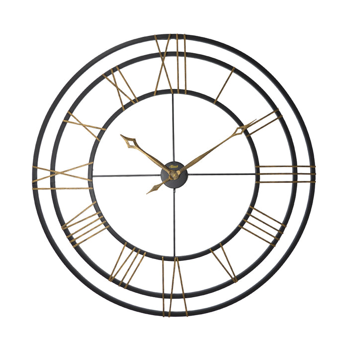 Large round wall clock with black frame and gold Roman numerals on a white background