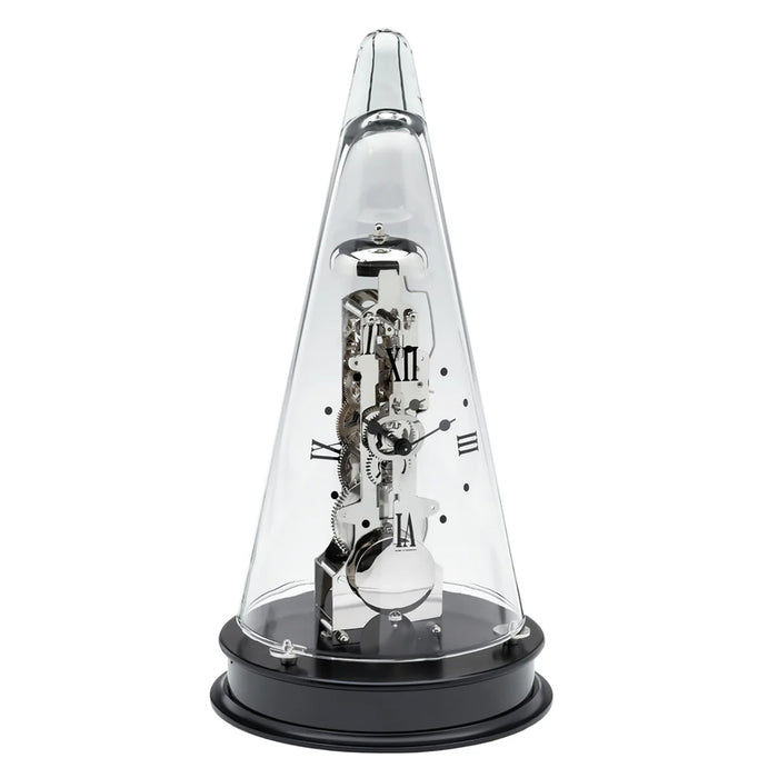 Conical decorative clock with silver gearing visible beneath glass dome, sitting on black base