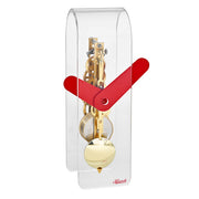Clear acrylic desk clock with visible brass gearing inside and red hands