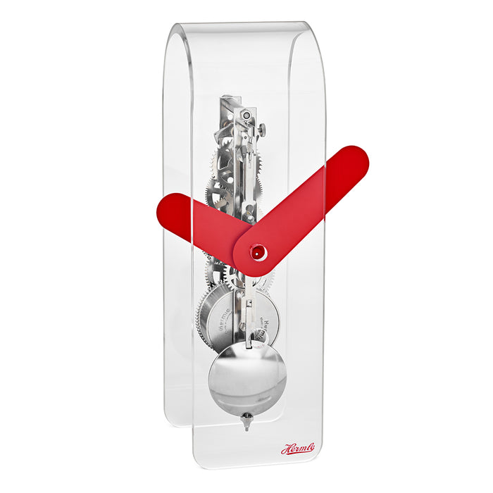 Clear acrylic desk clock with visible silver gearing inside and red hands