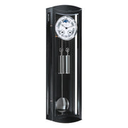 Black and silver wall clock with blue moon dial and dual weights on white background.