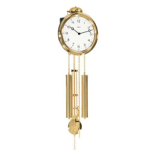 Gold finish wall clock with chains and weights on white background.