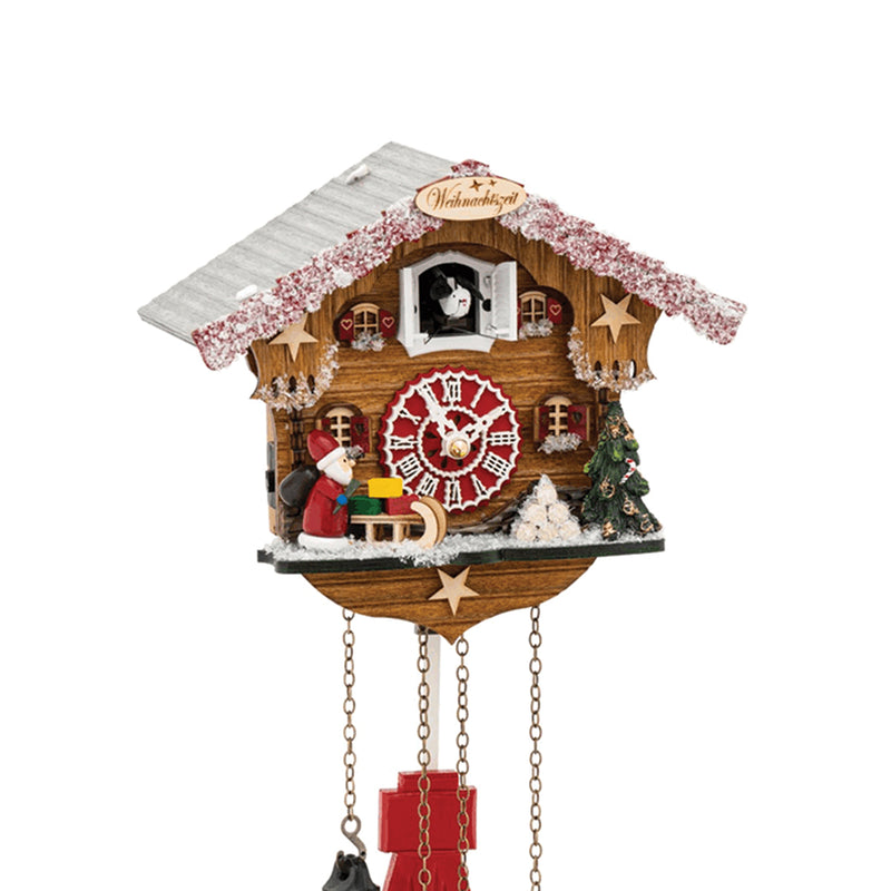 German Christmas-themed cuckoo clock with Santa figurine
