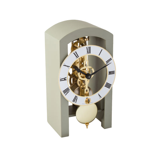 Mechanical clock with grey casing and silver face on a white background