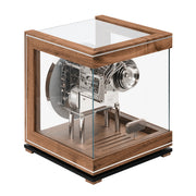 Intricate gears inside glass paneled walnut perpetual calendar clock.
