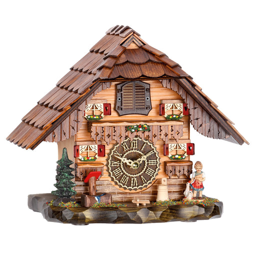 Cuckoo clock with wooden shingles, red shutters and girl with ducks figurine on white background.